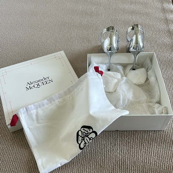 Alexander McQueen Pumps feature a wide ankle strap and buckle closure. - Picture 2 of 4